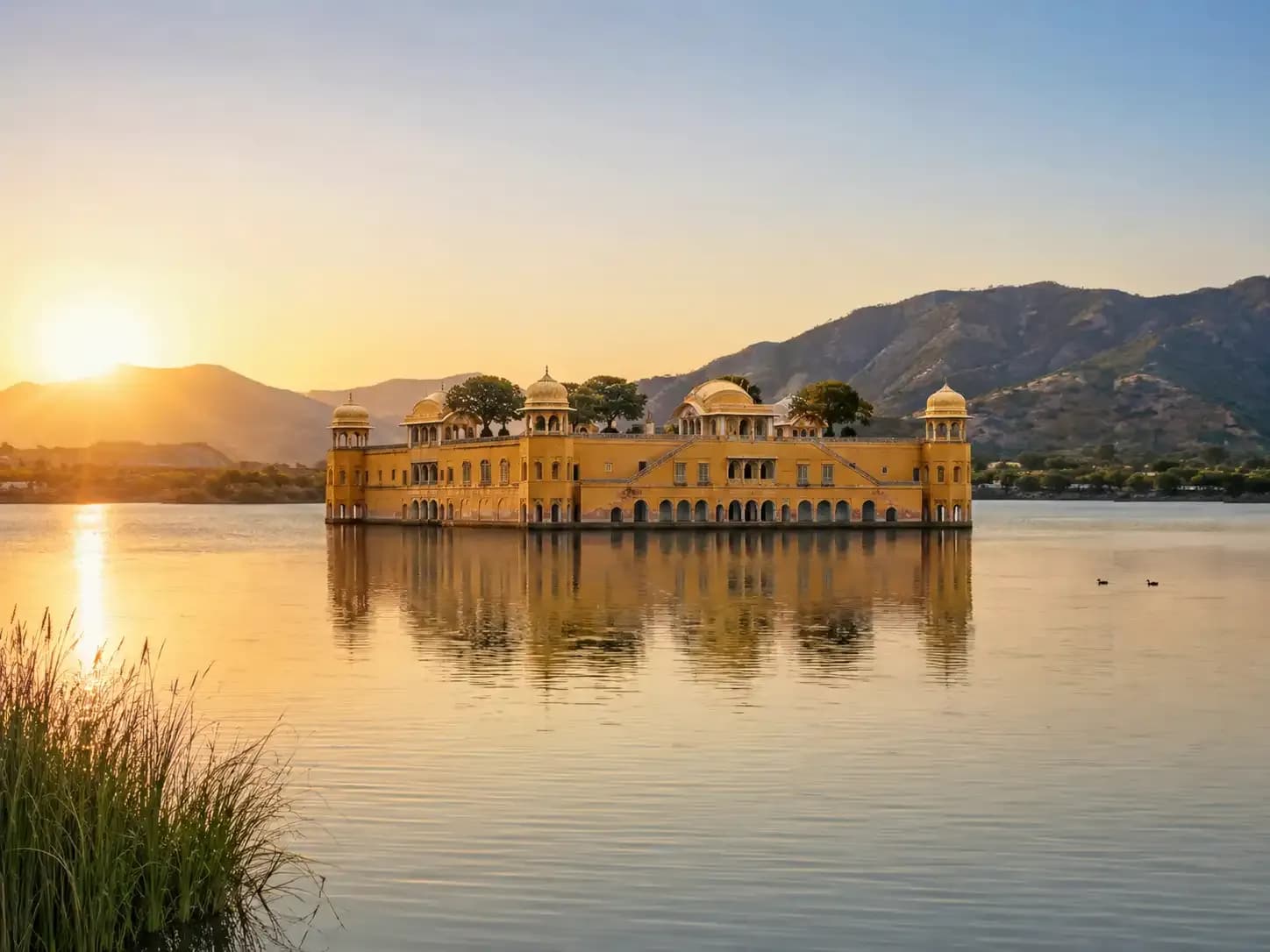 https://travjoy.s3.ap-south-1.amazonaws.com/jal_mahal_1_1_e64e9bcfbb.webp