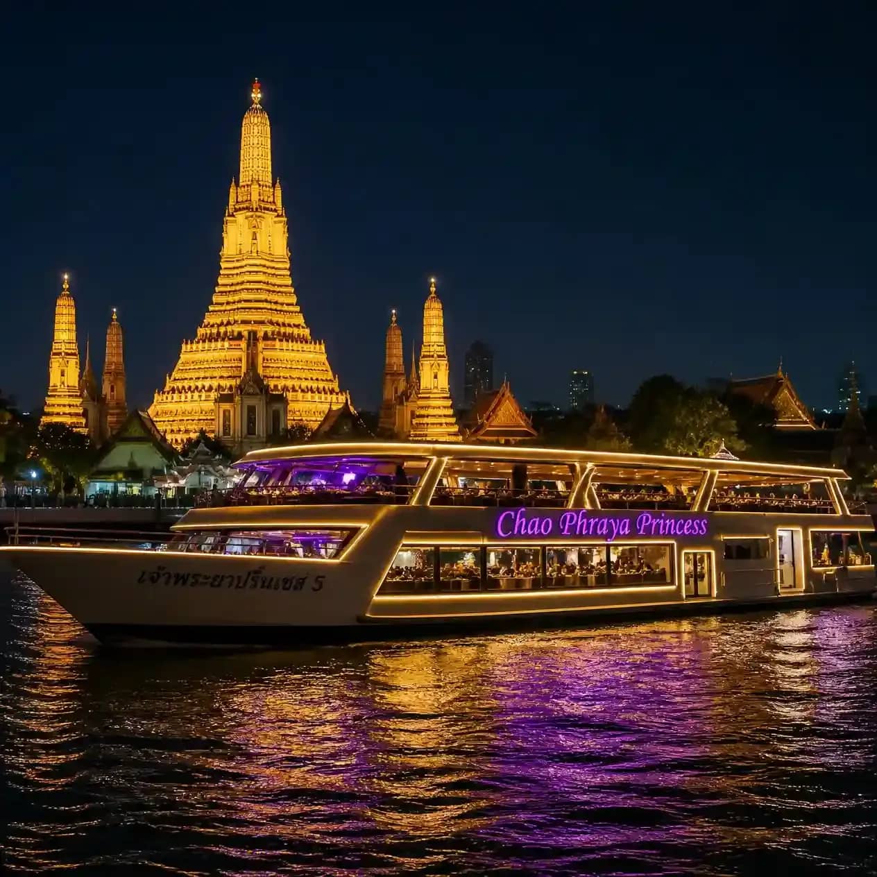 Chao Phraya Princess dinner cruise boat lit up at night on the river with Wat Arun illuminated behind,_compressed.webp