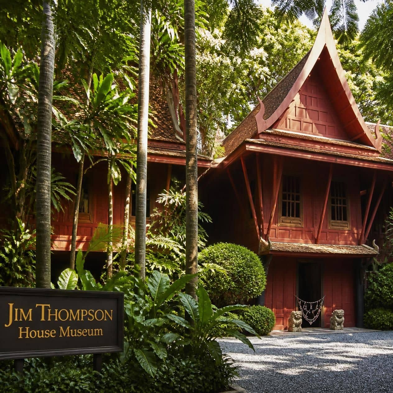 Jim Thompson House in Bangkok, photorealistic exterior view, lush tropical.jpg