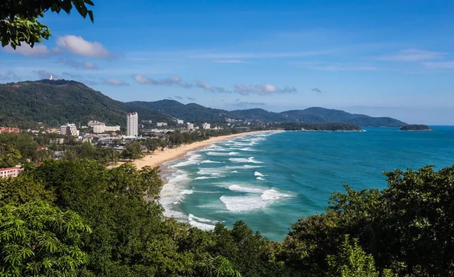 https://travjoy.s3.ap-south-1.amazonaws.com/Karon_Beach1_87d7c24bad.webp