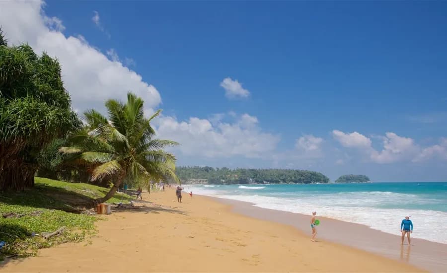 https://travjoy.s3.ap-south-1.amazonaws.com/Karon_Beach_1_4c0b767a5d.webp