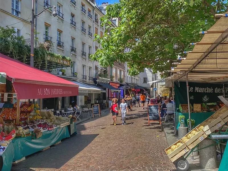 https://travjoy.s3.ap-south-1.amazonaws.com/Rue_Mouffetard_Market_1_8dbe63f3f9.webp