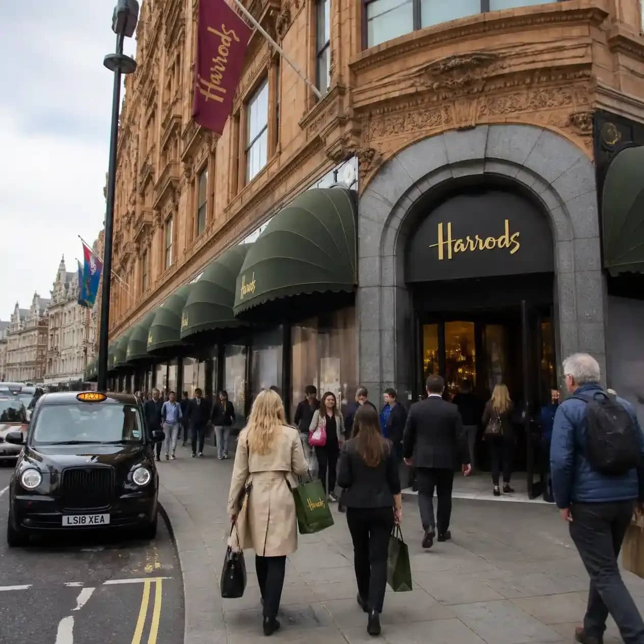 Visiting Harrods in London, shoppers arriving at the iconic terracotta department store_compressed.webp
