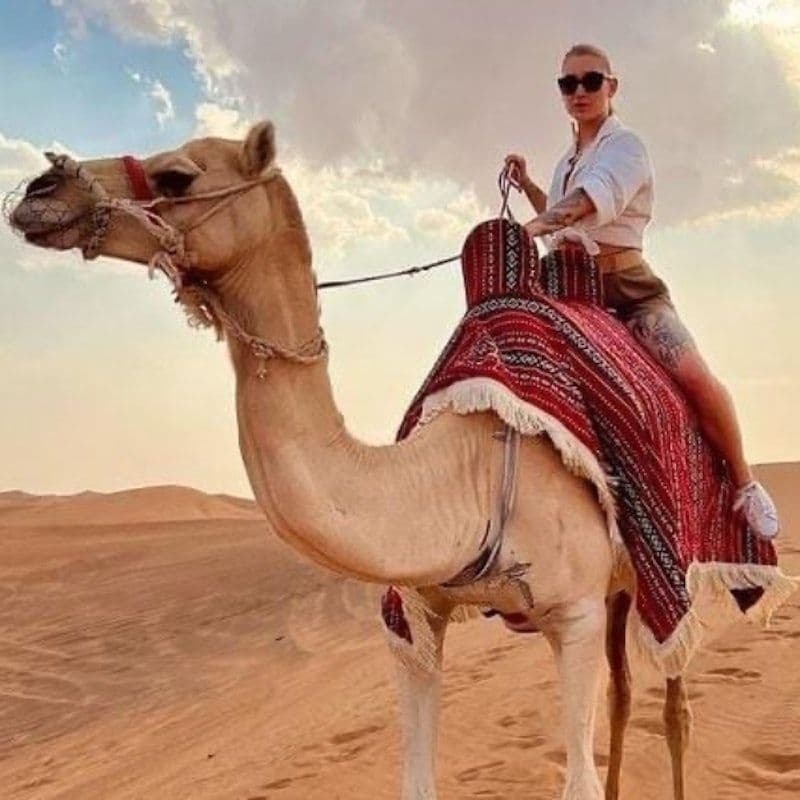 Sunset Desert Safari: Quad Bike, Sandboarding, Camel Ride + BBQ Dinner